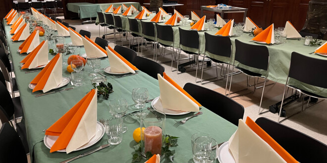 Two long tables decorated for thanksgiving